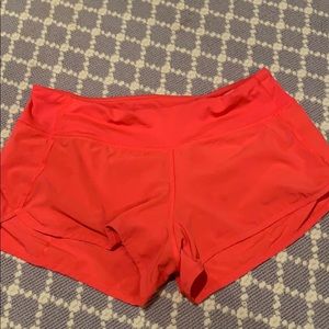 Neon pink lululemon shorts